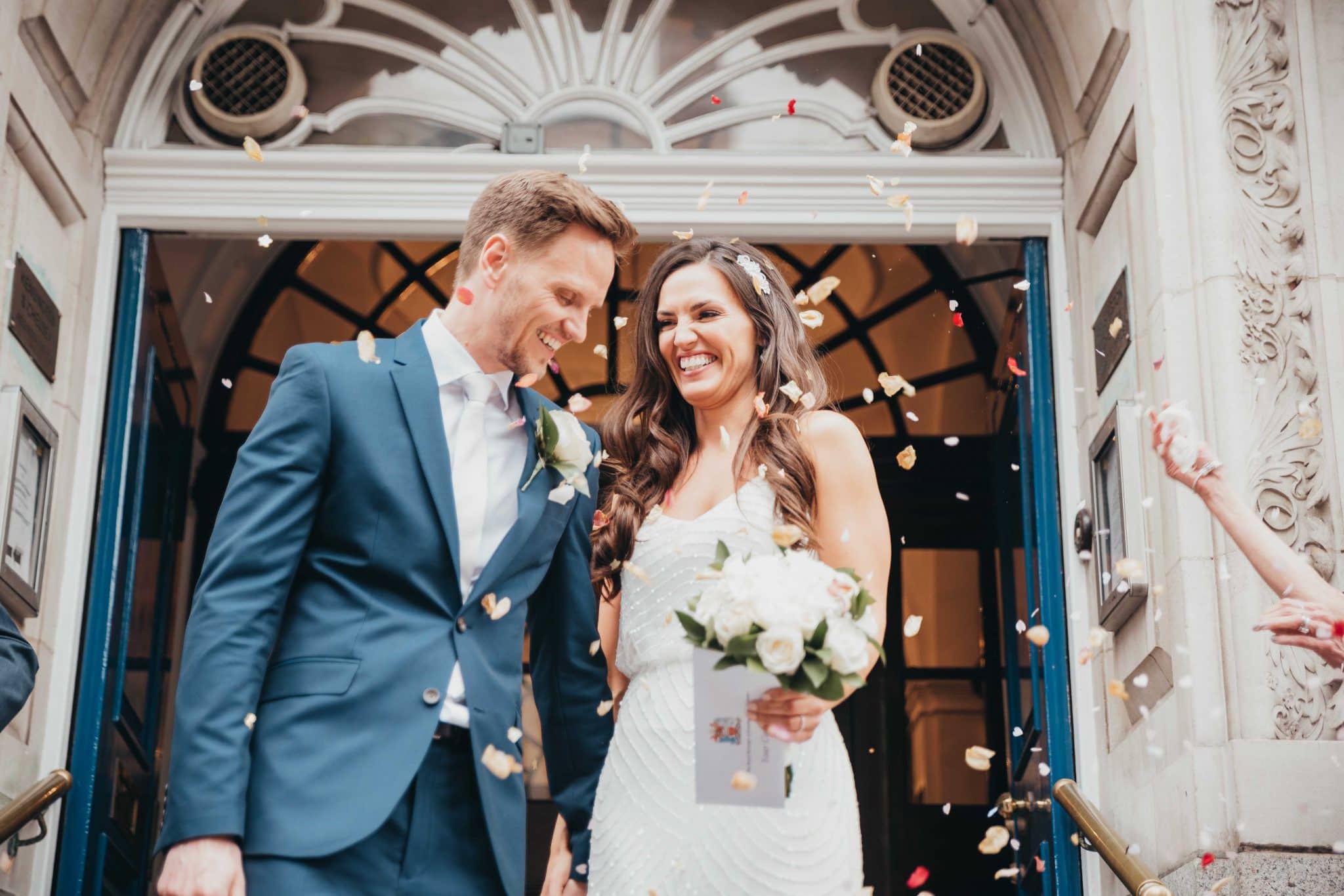Married couple at the registry office, confetti shot,
