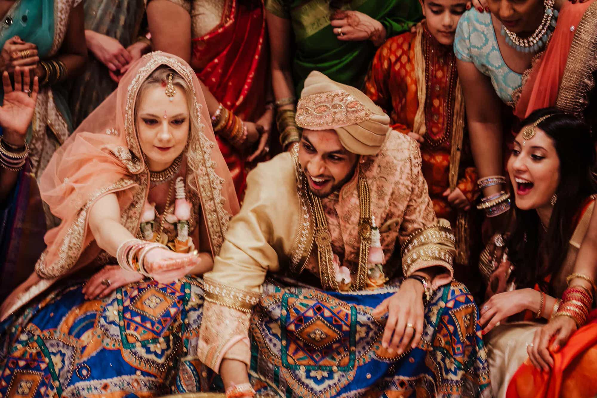 bride and groom playing Indian Ring ceremony game