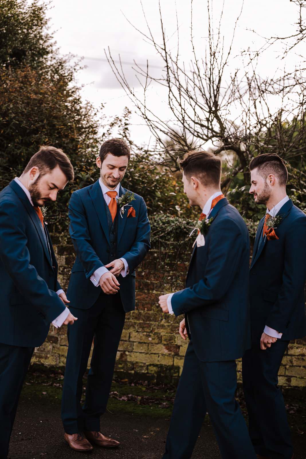 Wedding ceremony groom and the groomsmen in blue suits Roshni photography The Milling Barn, Bluntswood Hall, Throcking wedding photographer