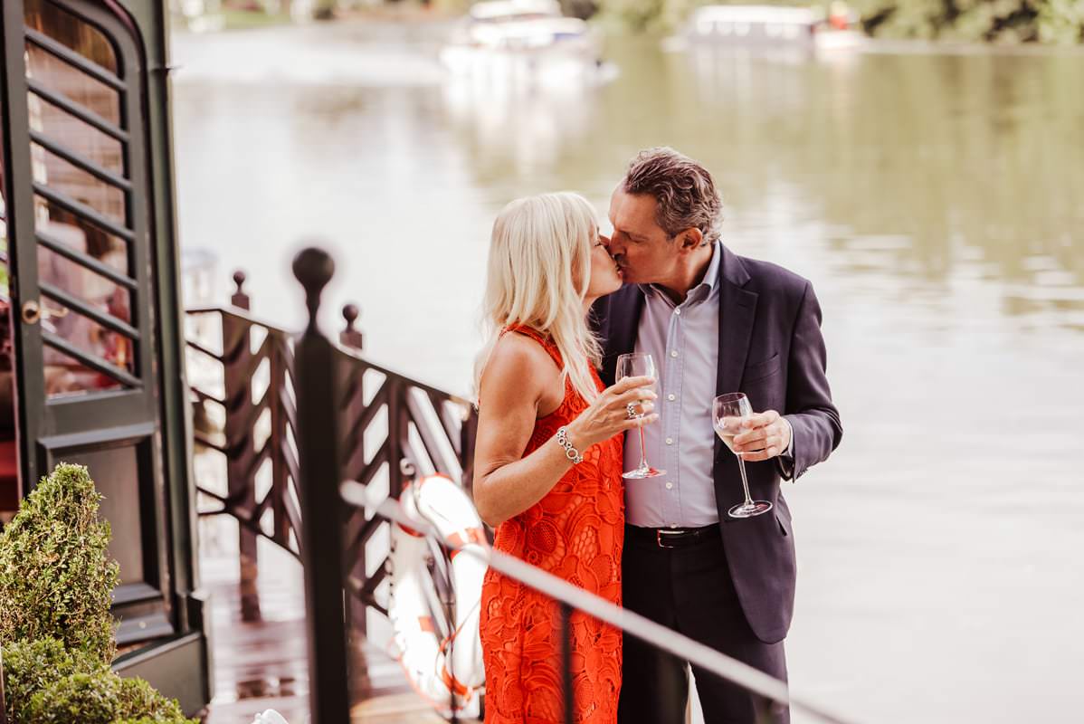 Couple celebrating their wedding at The Waterside Inn,Ferry Road, Bray, Maidenhead
