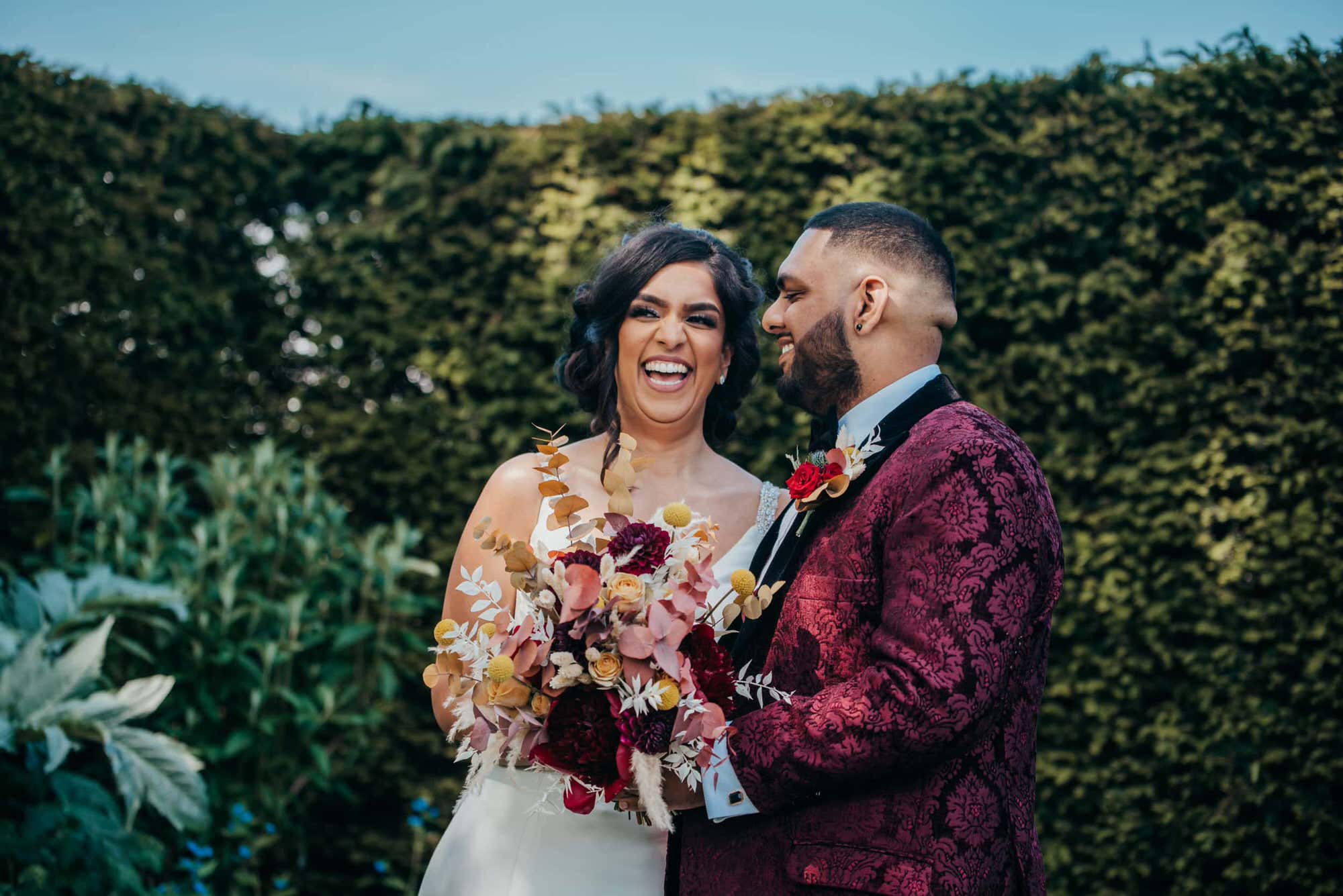 micklesfield-hall-hertfordshire-fusion-wedding-photographer-roshni-photography-couple-laughing