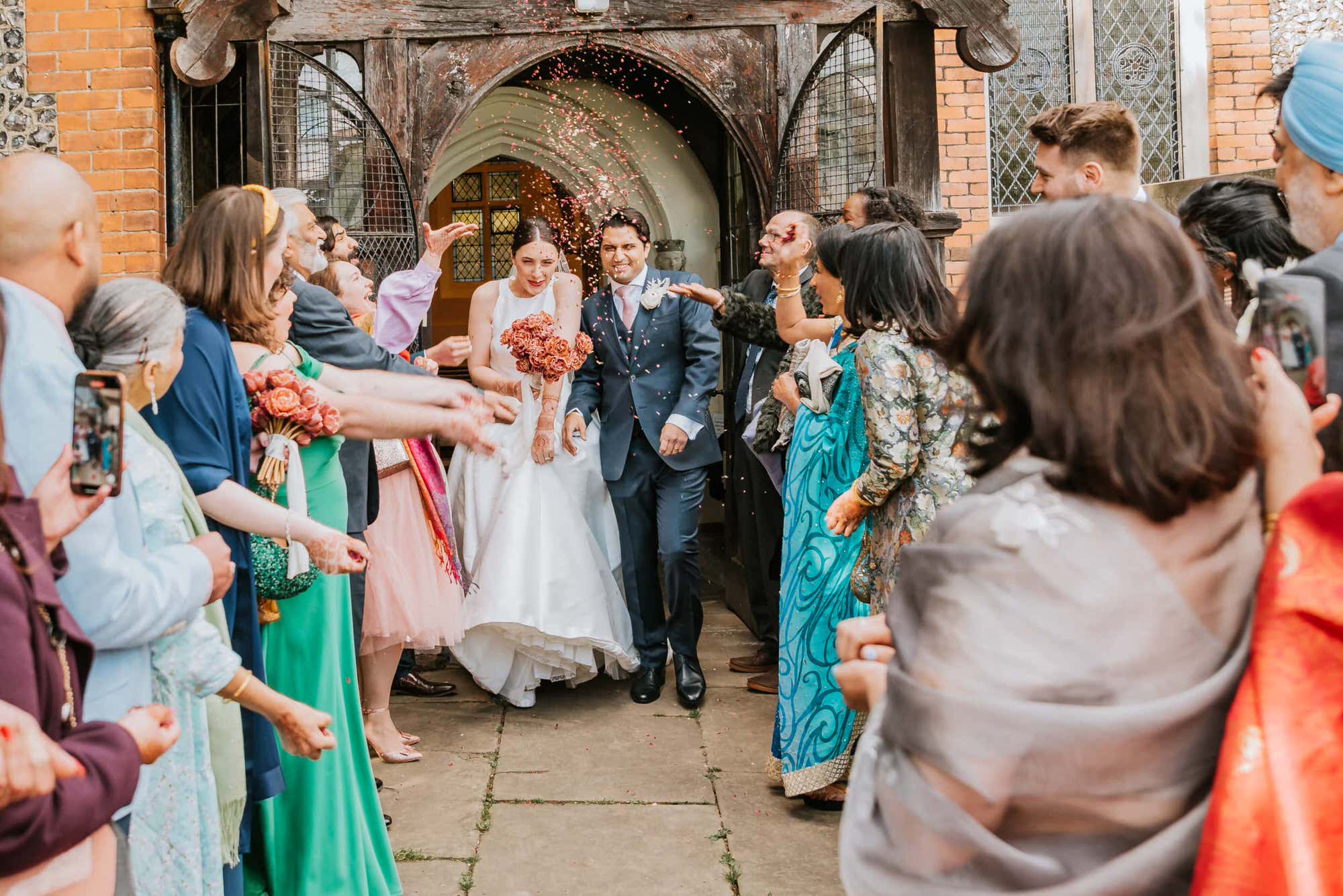 the-langham-london-fusion-wedding-photographer-roshni-photography-church-ceremony-confetti