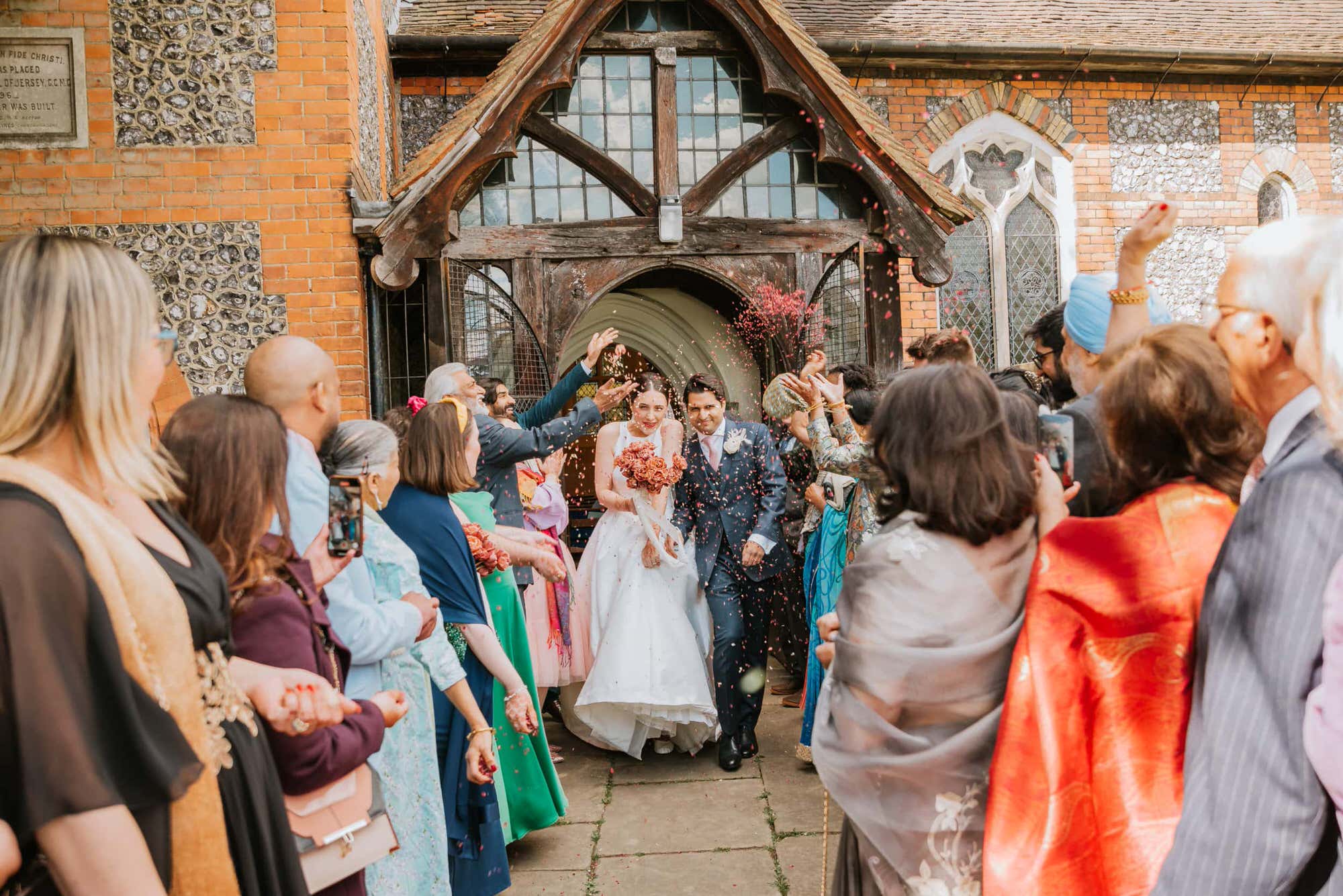 the-langham-london-fusion-wedding-photographer-roshni-photography-church-ceremony-confetti