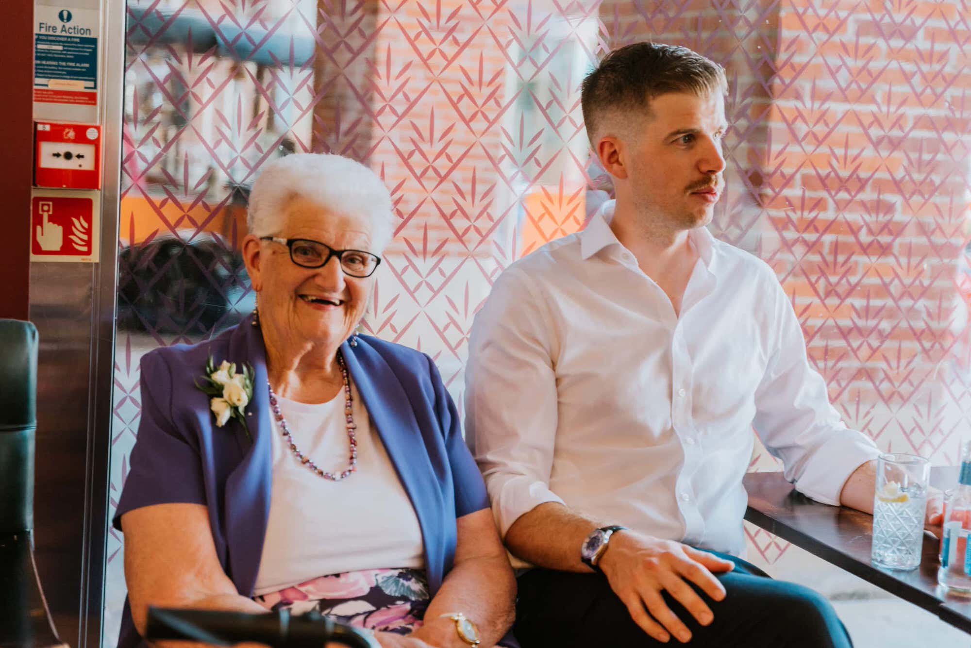 Groom with his grandma in the blue jacket