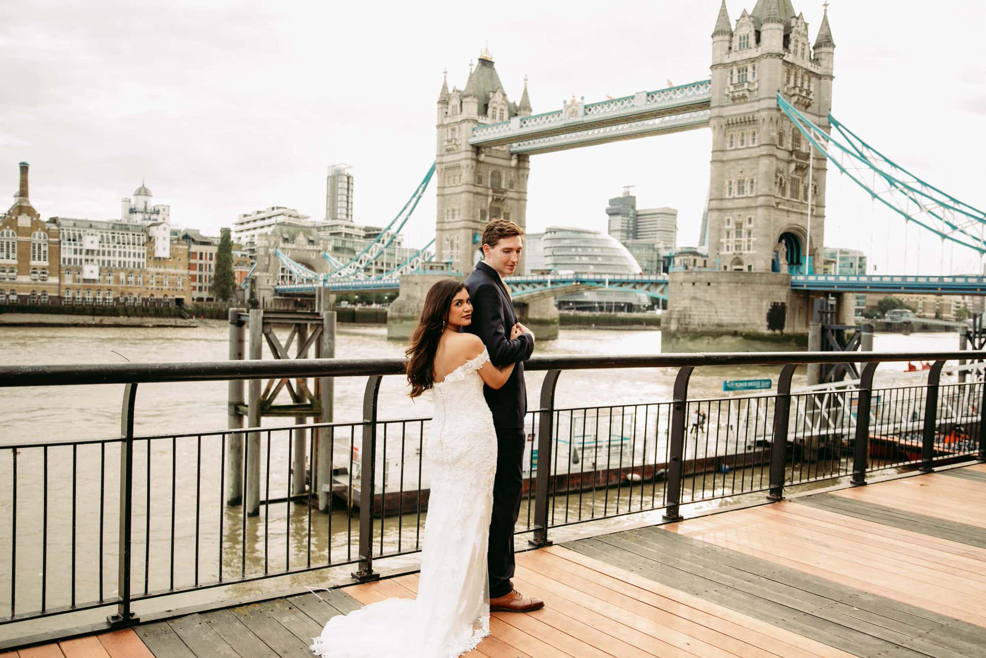 dickens-inn-tower-hill-london-fusion-wedding-photographer-bride-groom-bridge