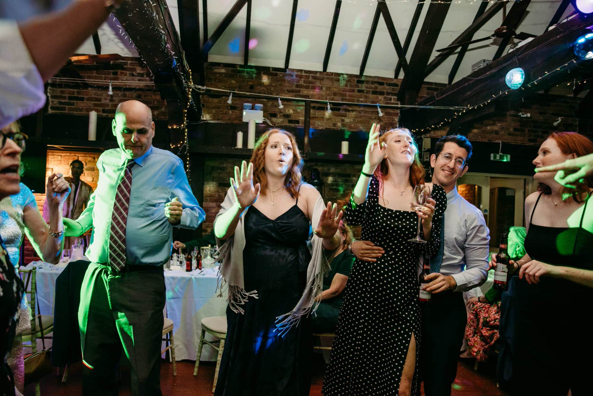 dickens-inn-tower-hill-london-london-wedding-photographer-roshni-photography-guests dancing